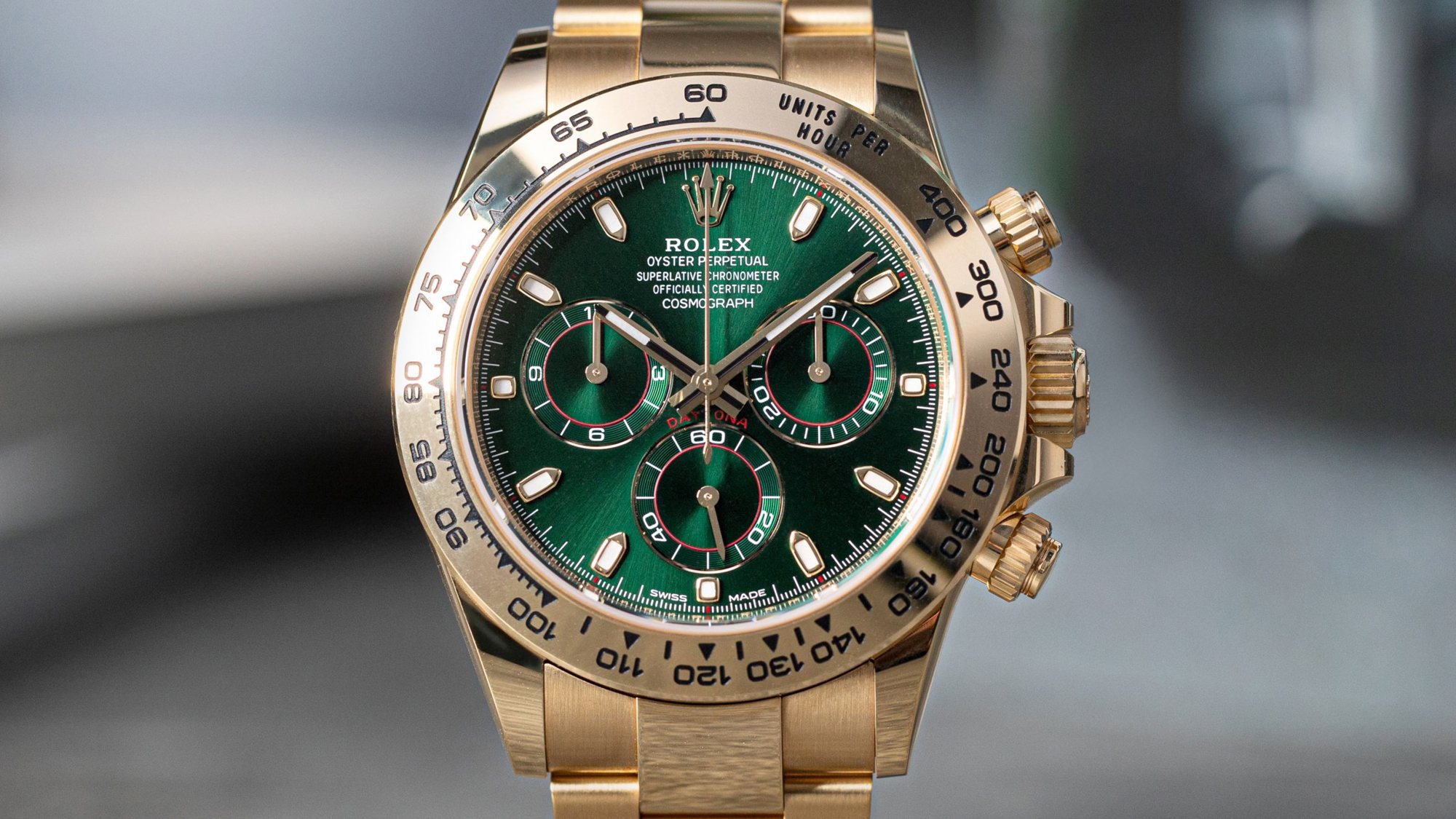 Rolex Daytona in yellow gold with green dial